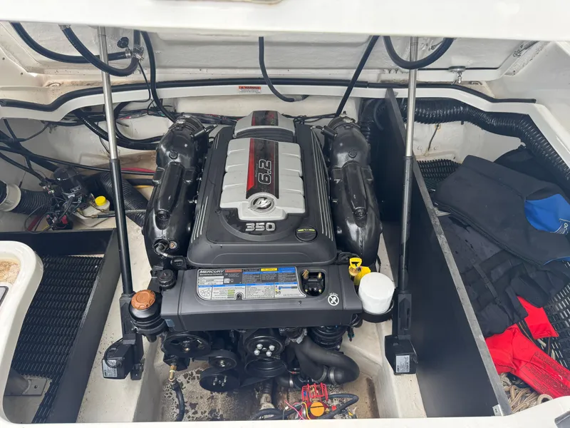 Slide: The Image of Engine compartment of 2022 Monterey 278SS Super Sport boat, featuring a powerful 6.2L engine. - 20
