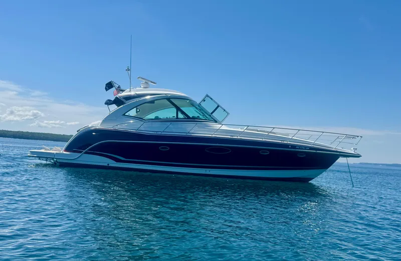 Slide: The Image of 2014 Formula 45 Yacht on calm blue water under clear sky. - 2