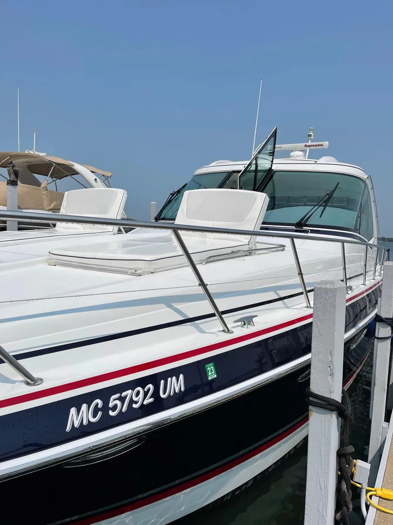 Slide: The Image of 2014 Formula 45 Yacht docked, featuring sleek design and modern amenities. - 20