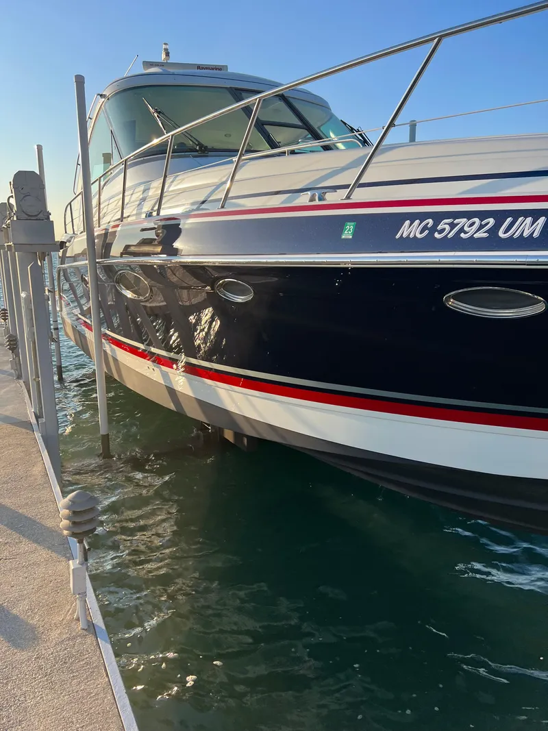 Slide: The Image of 2014 Formula 45 Yacht docked, showcasing sleek design and elegant exterior. - 22