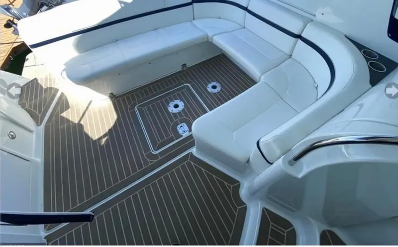 Slide: The Image of Luxurious seating area on a 2014 Formula 45 Yacht with sleek white cushions. - 29