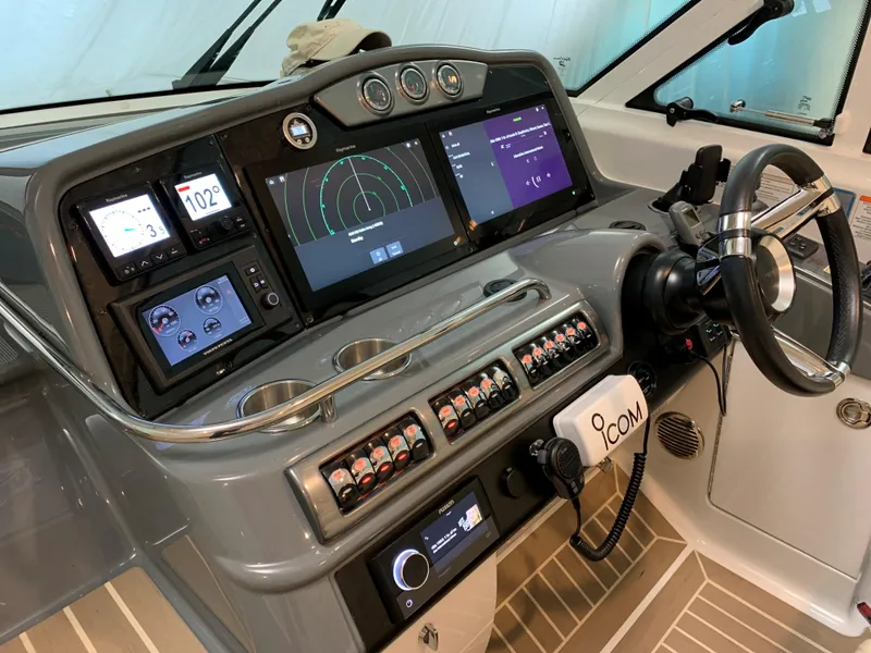 Slide: The Image of Control panel of a 2014 Formula 45 Yacht with advanced navigation displays. - 35