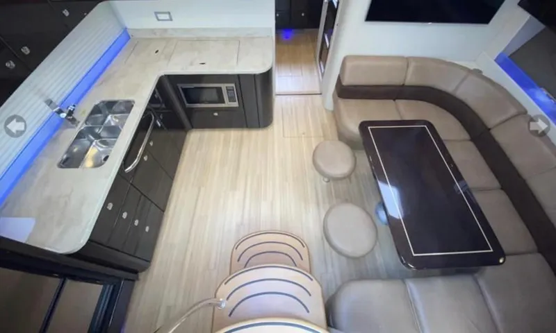 Slide: The Image of Luxurious interior of 2014 Formula 45 Yacht with modern kitchen and elegant seating area. - 38