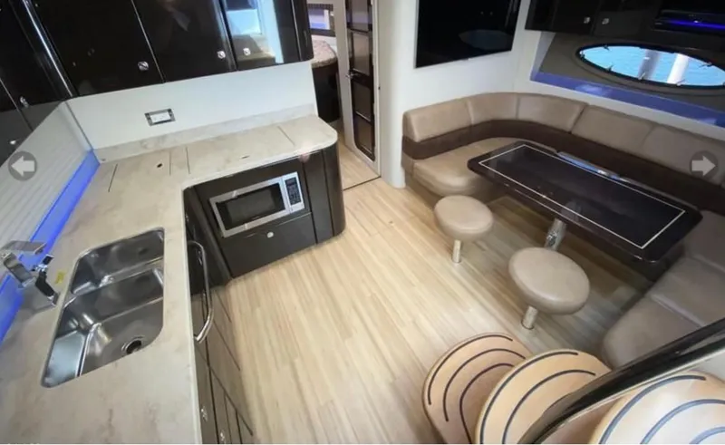 Slide: The Image of Luxurious interior of a 2014 Formula 45 Yacht with modern kitchen and seating area. - 39