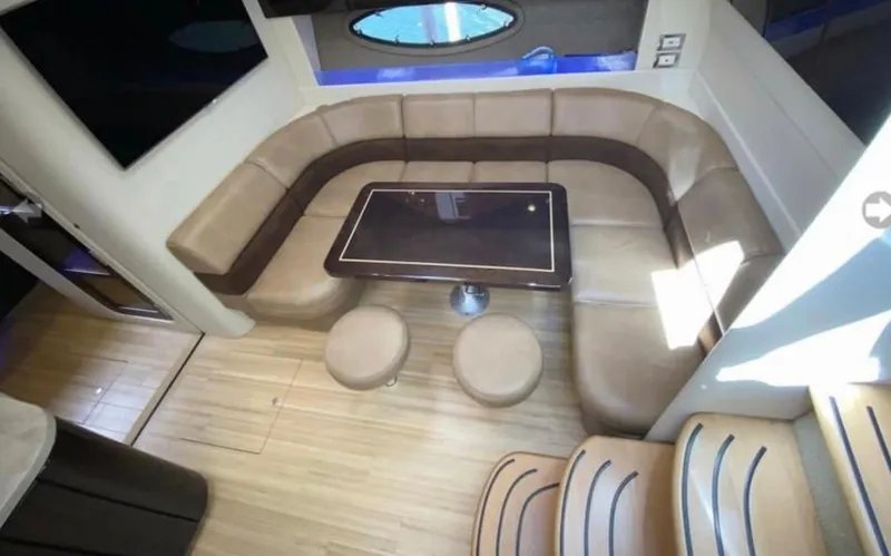 Slide: The Image of Luxurious interior of a 2014 Formula 45 Yacht with elegant seating and table. - 40