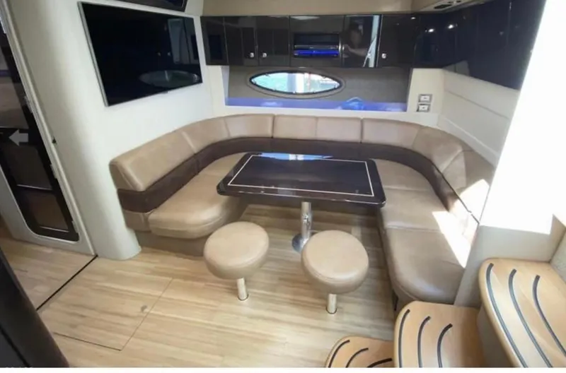 Slide: The Image of Luxurious interior of 2014 Formula 45 Yacht with leather seating and wooden flooring. - 41