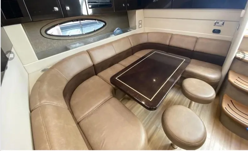 Slide: The Image of Luxurious interior of a 2014 Formula 45 Yacht with leather seating and elegant table. - 42