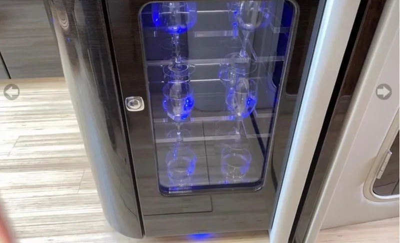 Slide: The Image of Glass cabinet with blue lighting on a 2014 Formula 45 Yacht. - 44