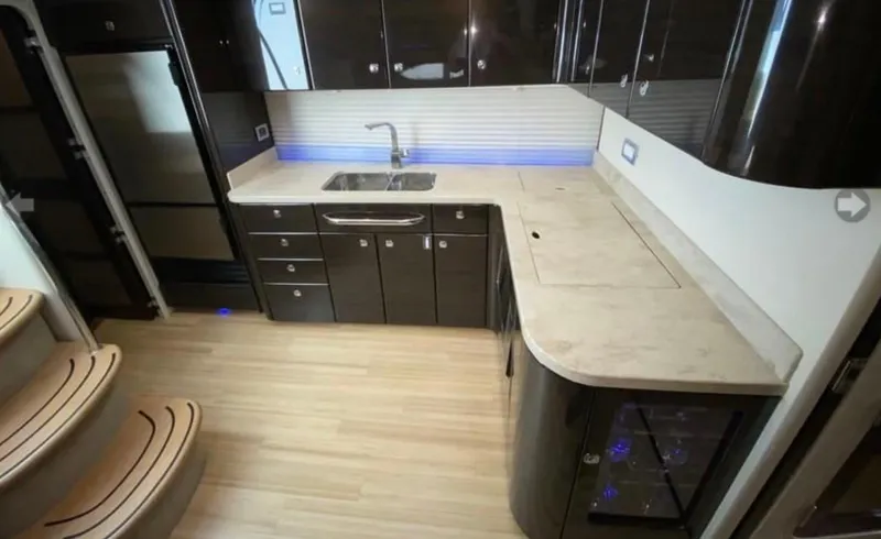 Slide: The Image of Luxurious kitchen interior of 2014 Formula 45 Yacht with modern cabinetry and sleek countertops. - 46