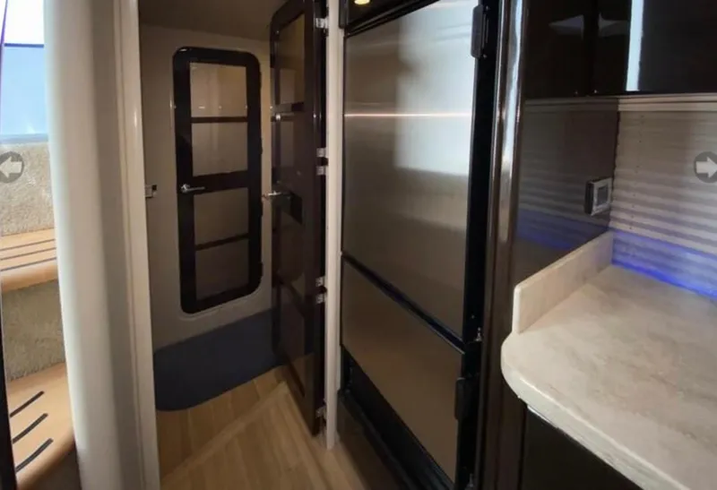 Slide: The Image of Interior of 2014 Formula 45 Yacht featuring modern kitchen and sleek design. - 48