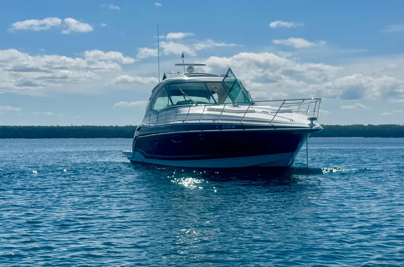 Slide: The Image of 2014 Formula 45 Yacht on calm blue water under a clear sky. - 5