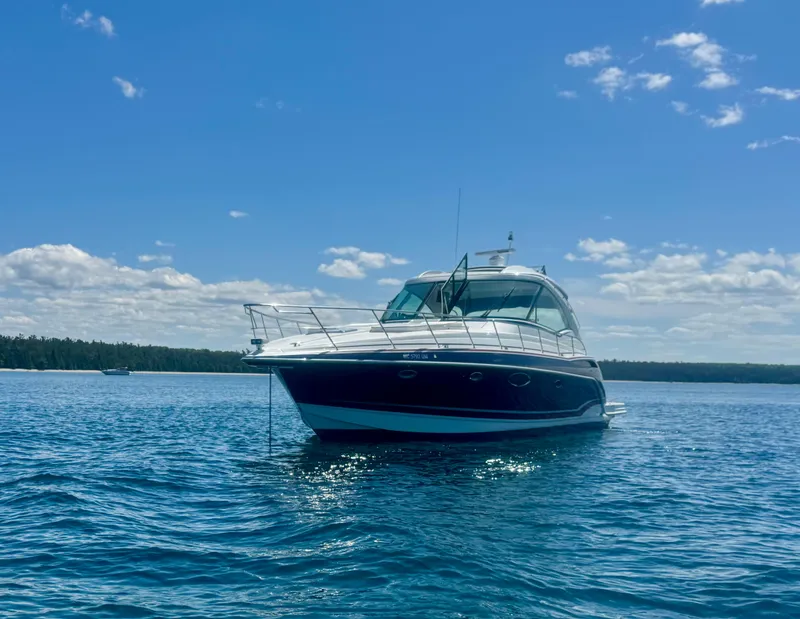 Slide: The Image of 2014 Formula 45 Yacht on calm blue water under a clear sky. - 6