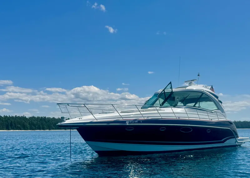 Slide: The Image of 2014 Formula 45 Yacht on calm blue water under clear sky. - 7
