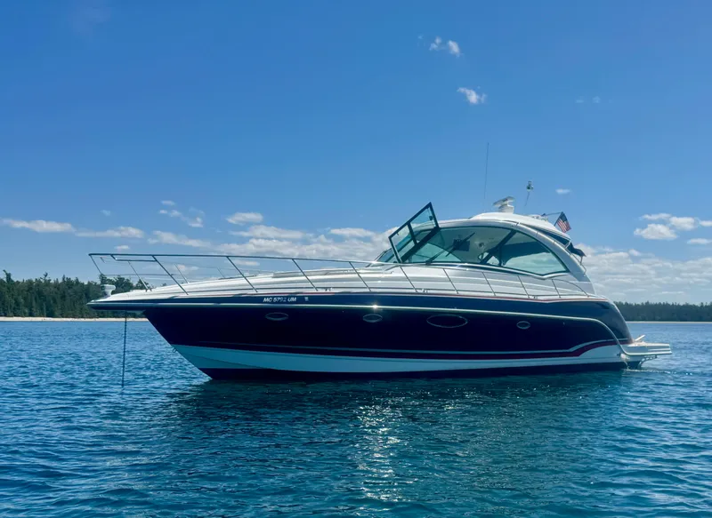 Slide: The Image of 2014 Formula 45 Yacht on serene blue water under clear sky. - 9