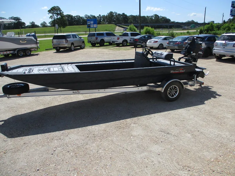 Slide: The Image of 2025 Gator Tail 2060 EXTREME boat on trailer in parking lot. - 3
