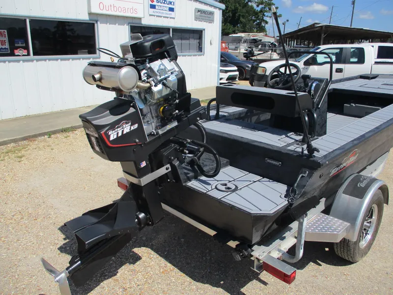 Slide: The Image of 2025 Gator Tail 2060 EXTREME boat with powerful outboard motor, parked outdoors. - 7