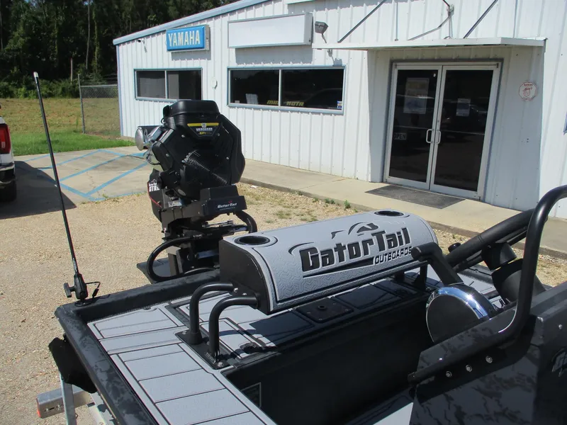 Slide: The Image of Gator Tail 2060 EXTREME boat outside Yamaha dealership, showcasing outboard motor, 2025 model. - 9