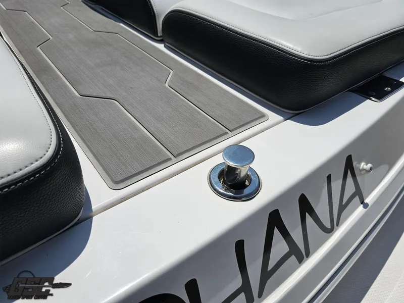 Slide: The Image of 2018 Regal 2300 Bowrider boat deck with cushioned seating and cleat. - 40