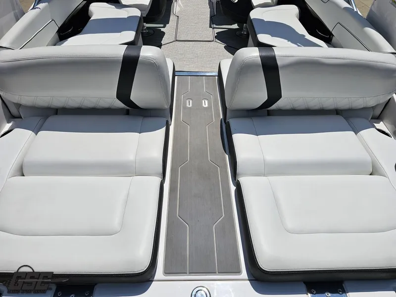Slide: The Image of 2018 Regal 2300 Bowrider interior with luxurious white seating and sleek design. - 41