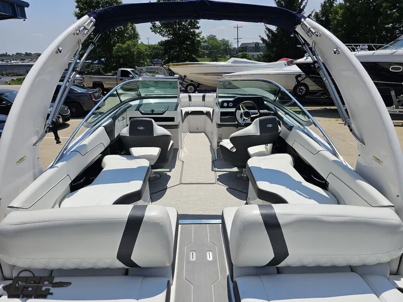 Slide: The Image of 2018 Regal 2300 Bowrider boat interior with white seating and sleek design. - 42