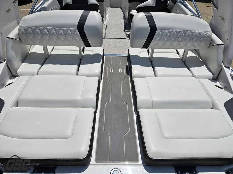 Slide: The Image of 2018 Regal 2300 Bowrider interior with luxurious white seating and sleek design. - 45