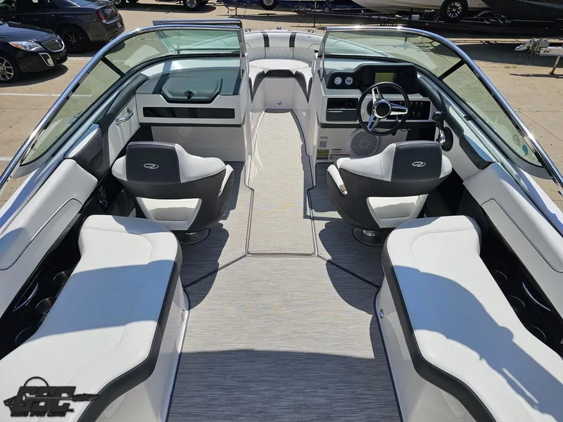 Slide: The Image of 2018 Regal 2300 Bowrider interior with sleek seating and modern dashboard design. - 49