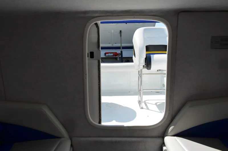 Slide: The Image of Interior view of 2008 Baja 26 Outlaw boat, showing seating and cockpit area. - 34