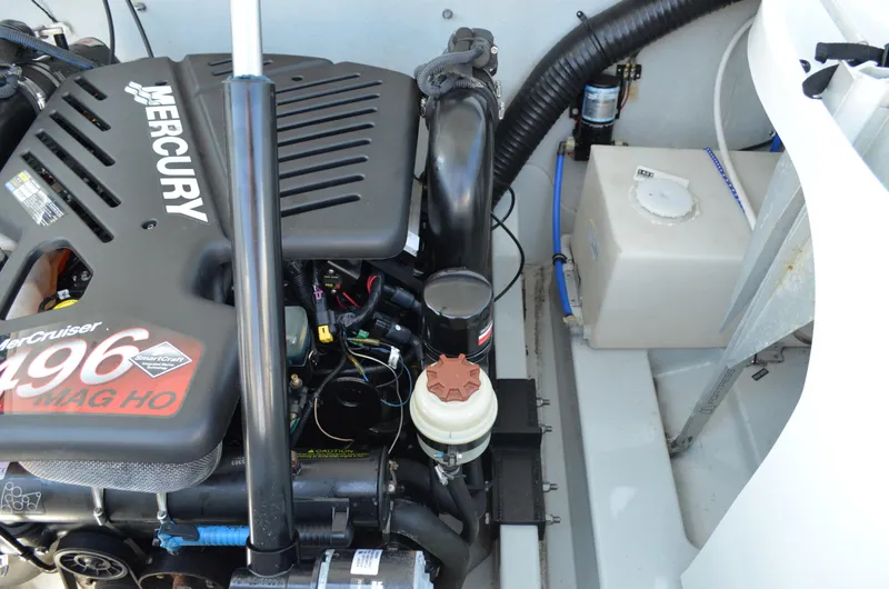 Slide: The Image of Engine compartment of a 2008 Baja 26 Outlaw with Mercury 496 MAG HO engine. - 13