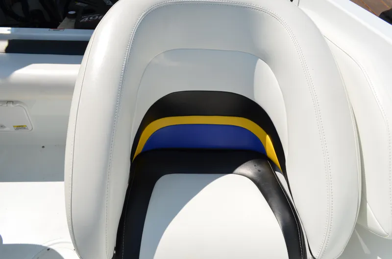 Slide: The Image of White and multicolored seat of 2008 Baja 26 Outlaw boat. - 22