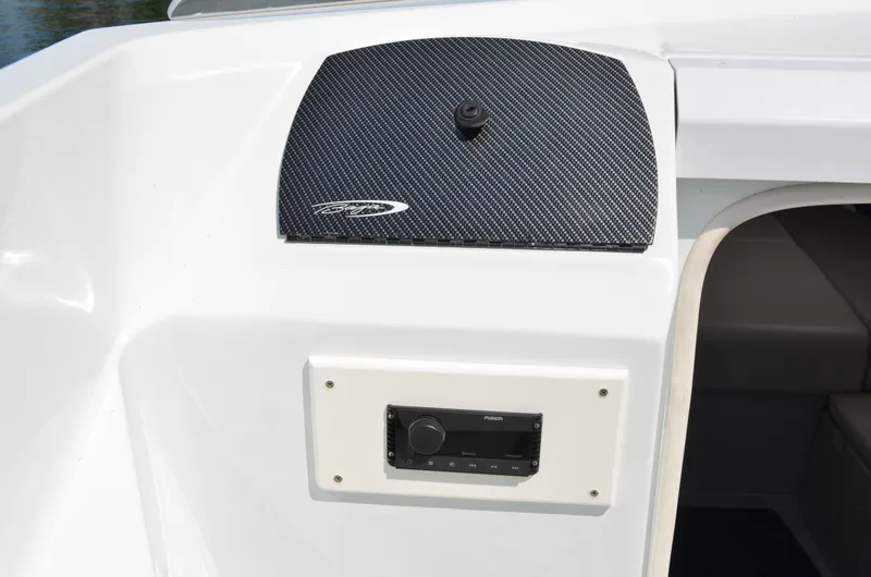 Slide: The Image of 2008 Baja 26 Outlaw boat dashboard with Fusion stereo system. - 24