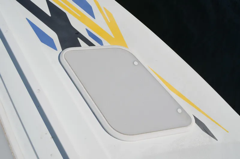 Slide: The Image of 2008 Baja 26 Outlaw boat deck with colorful graphic design. - 6