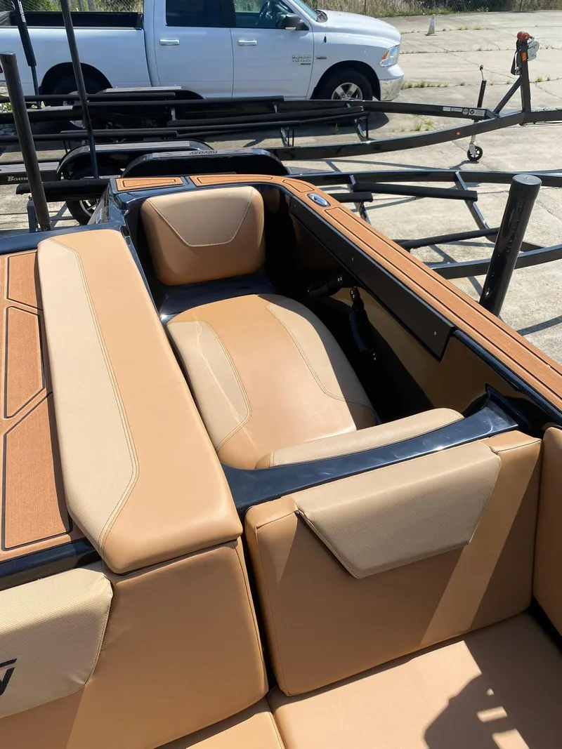Slide: The Image of 2025 Heyday WT-2DC boat interior with tan leather seating and sleek design. - 17