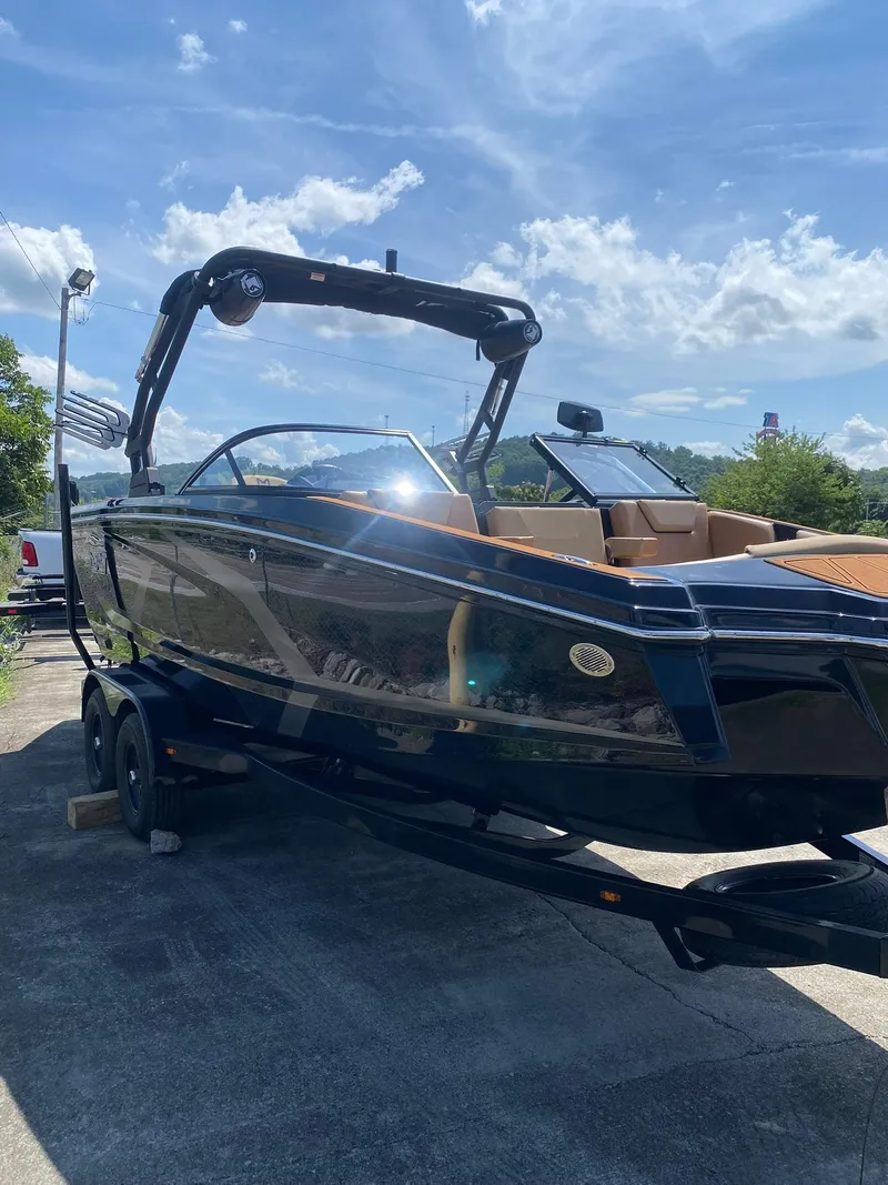 Slide: The Image of 2025 Heyday WT-2DC boat on trailer under blue sky with clouds. - 5