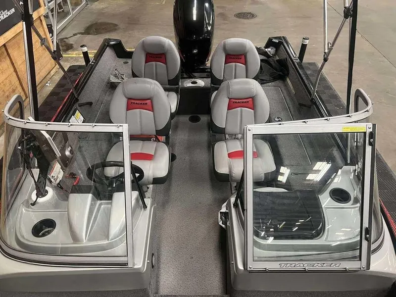 Slide: The Image of 2016 Tracker Pro Guide V-16 WT boat interior with seating and windshield. - 6