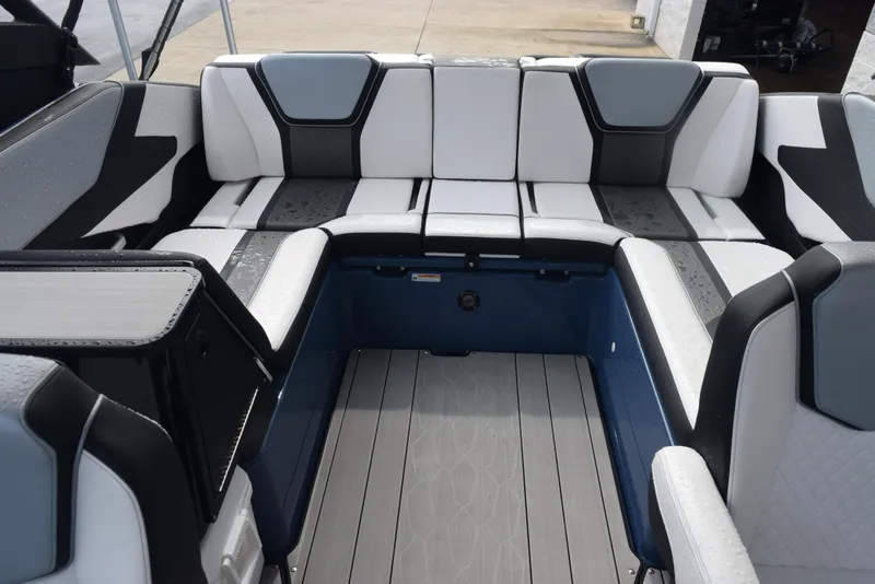 Slide: The Image of 2023 Yamaha Boats 255XD interior with modern seating and sleek design. - 13