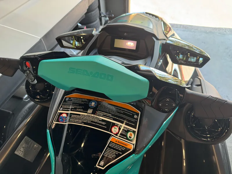 Slide: The Image of 2025 Sea-Doo GTR 230 dashboard and handlebars, featuring modern controls and display. - 8