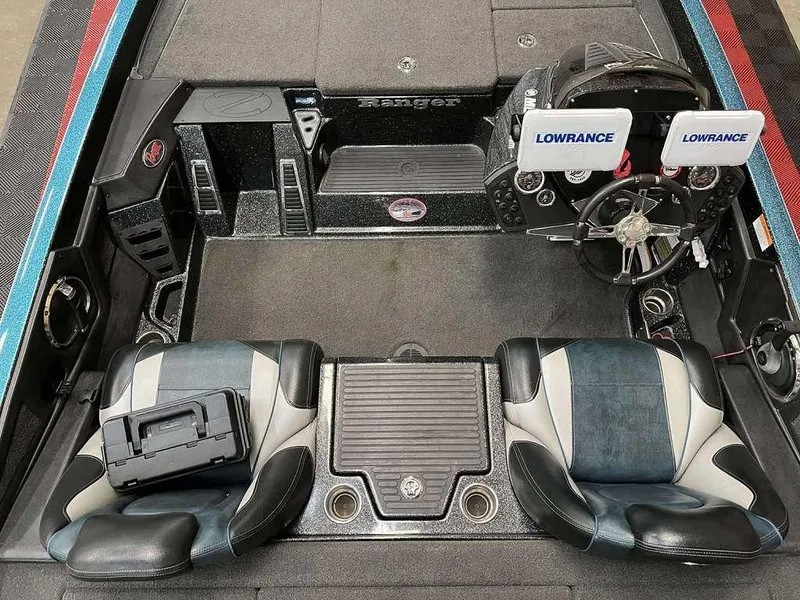 Slide: The Image of 2016 Ranger Z518c boat interior with dual Lowrance displays and two-tone seating. - 3