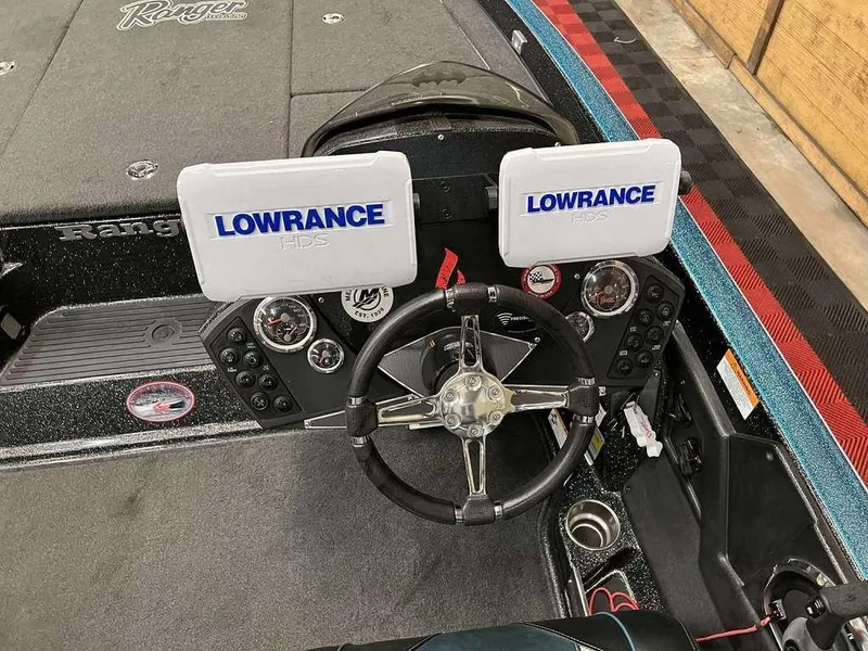 Slide: The Image of 2016 Ranger Z518c boat dashboard with dual Lowrance HDS displays and steering wheel. - 9