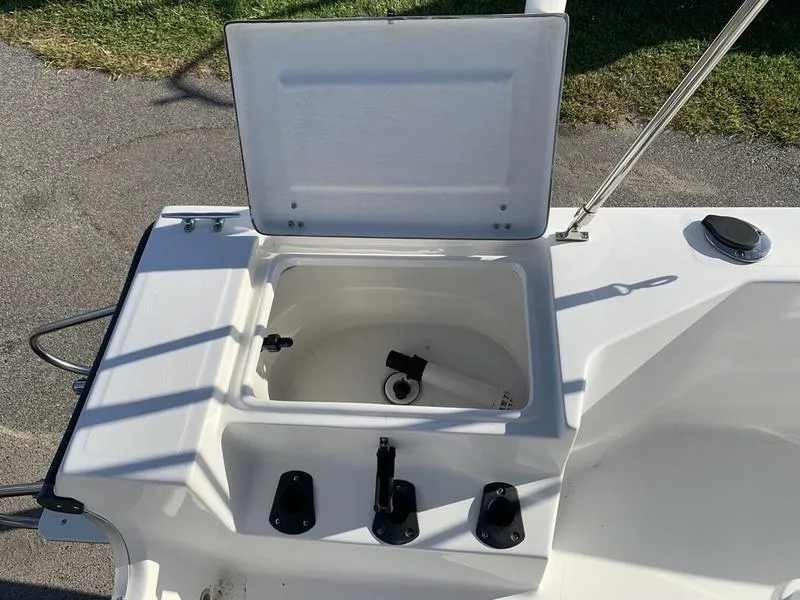 Slide: The Image of Open storage compartment on 2008 Sea King 180 CC boat, showing interior details. - 13