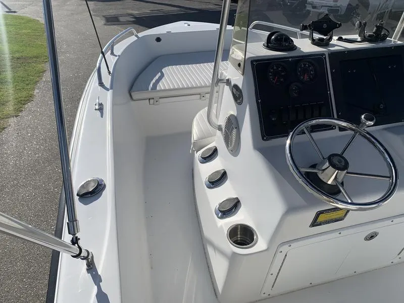 Slide: The Image of 2008 Sea King 180 CC boat interior with steering wheel and control panel. - 17