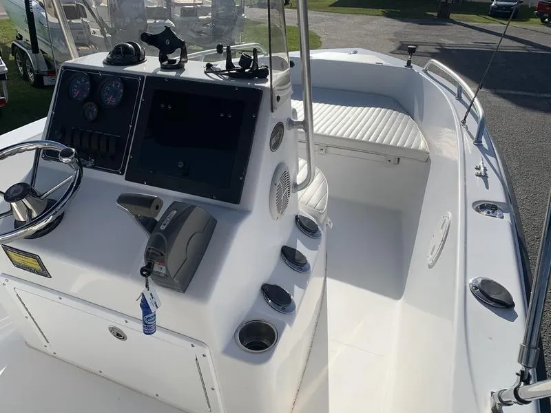 Slide: The Image of 2008 Sea King 180 CC boat interior with steering console and seating area. - 18