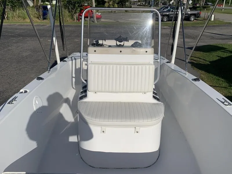 Slide: The Image of 2008 Sea King 180 CC boat interior with white seating and console. - 19