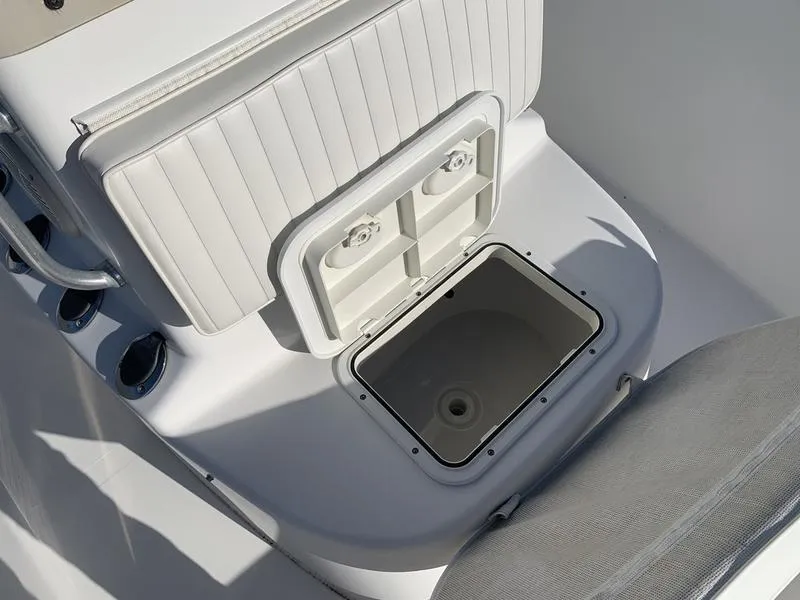 Slide: The Image of 2008 Sea King 180 CC boat interior with open storage compartment and seating. - 20