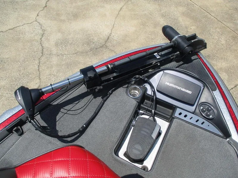 Slide: The Image of 2016 Triton 18 TrX boat deck with Humminbird electronics and Minn Kota trolling motor. - 6