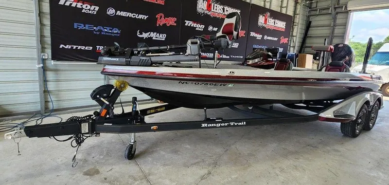 Slide: The Image of 2021 Ranger Z521C Ranger Cup Equipped boat on trailer in a garage setting. - 10