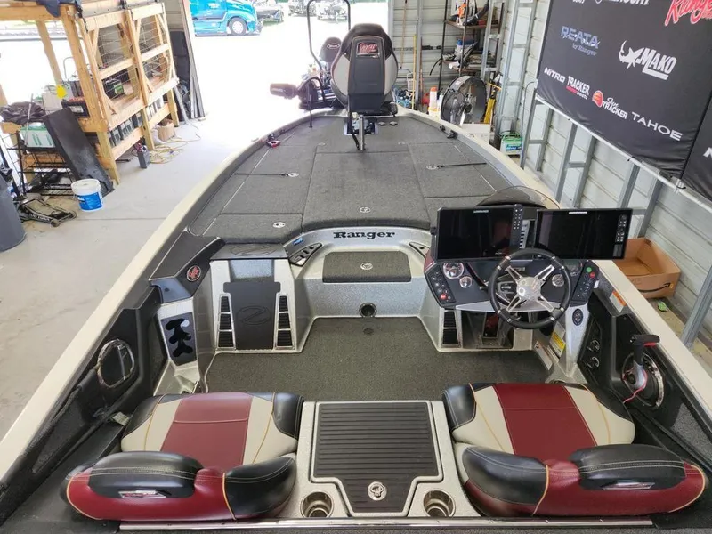 Slide: The Image of 2021 Ranger Z521C Ranger Cup Equipped boat interior with dual seats and advanced dashboard. - 4