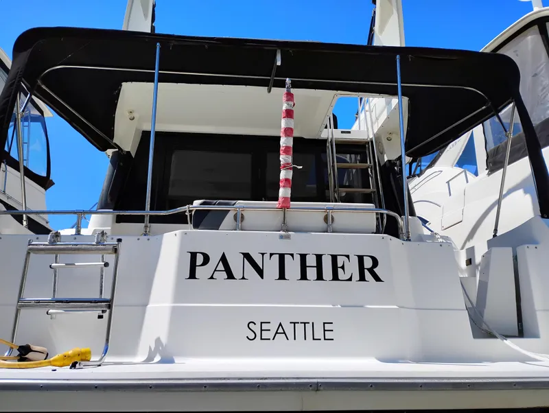 Slide: The Image of 1992 Bayliner 4388 Motoryacht "Panther" docked in Seattle, rear view. - 2