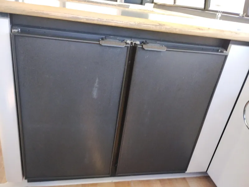 Slide: The Image of Cabinet doors in the 1992 Bayliner 4388 Motoryacht kitchen area. - 20