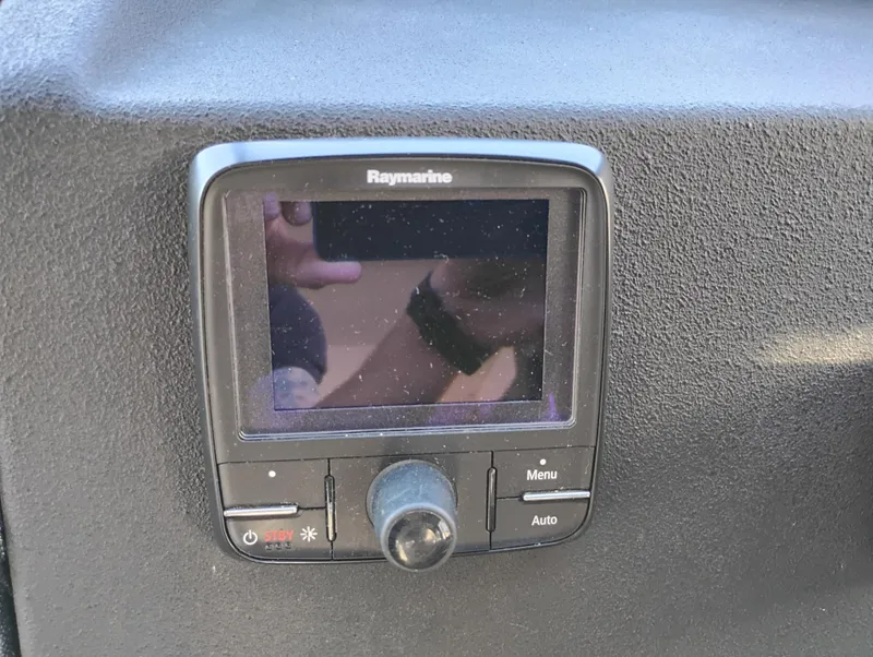 Slide: The Image of Raymarine control panel on 1992 Bayliner 4388 Motoryacht dashboard. - 25