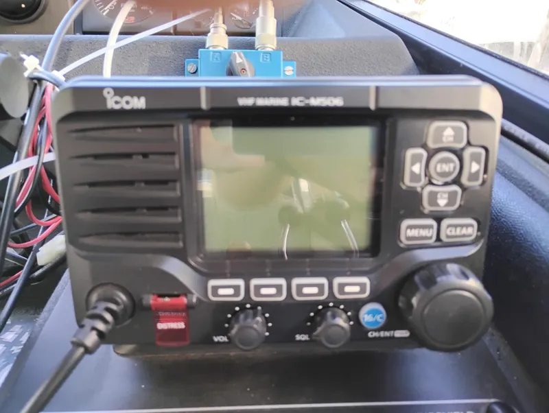 Slide: The Image of VHF marine radio on 1992 Bayliner 4388 Motoryacht dashboard. - 26